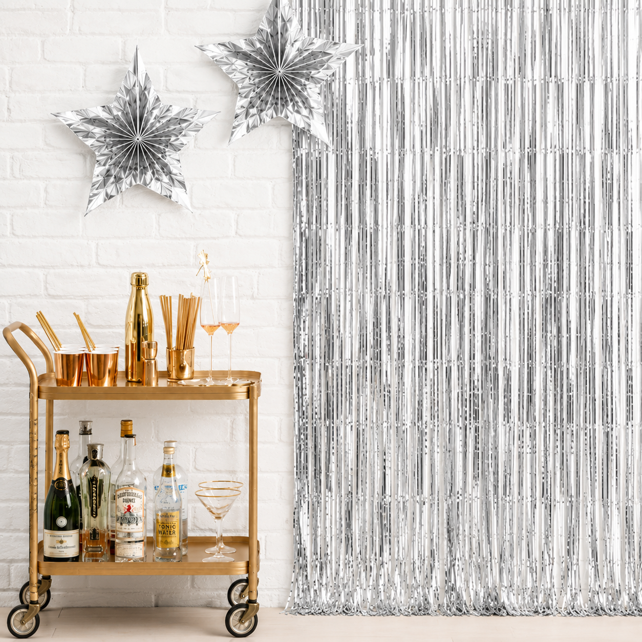 Silver metallic foil curtain backdrop for birthdays, weddings, baby showers, anniversaries, party decorations and photo booth backgrounds.